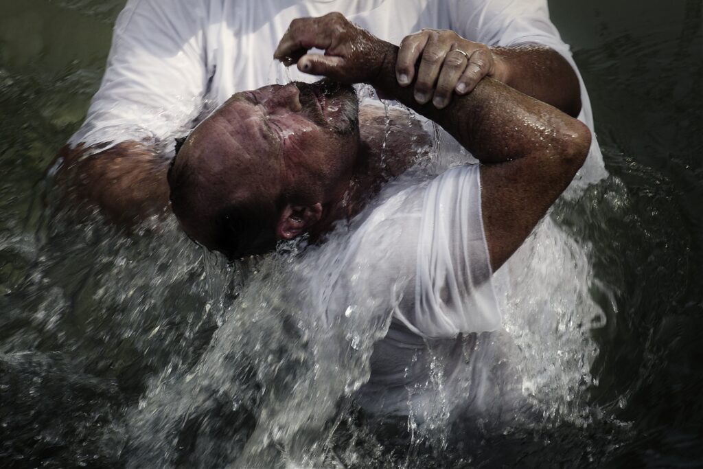 Christian baptism on Israel Photography Tour